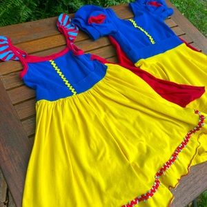 Size 4 moderately worn placard original dresses